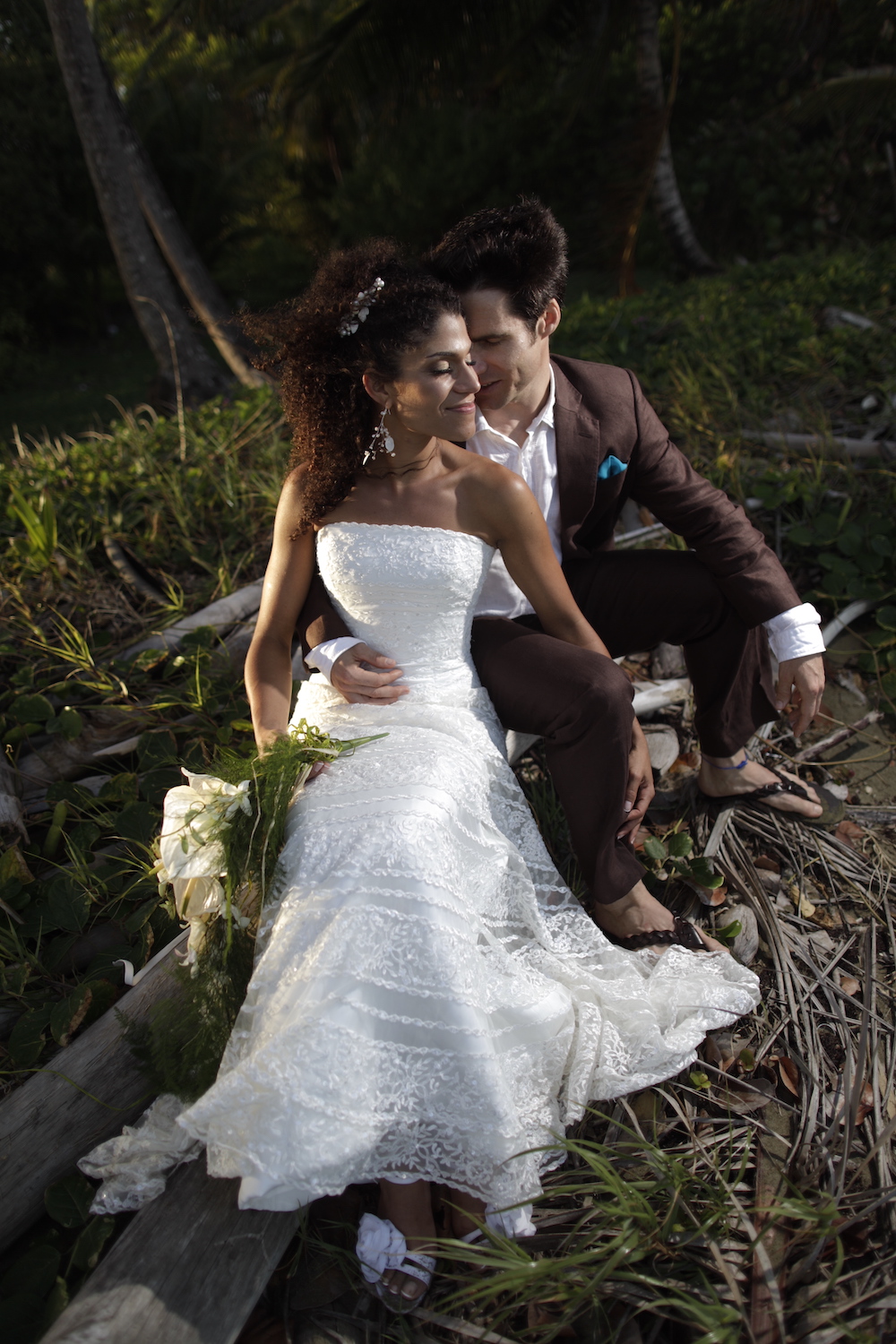 Bride and groom on beach